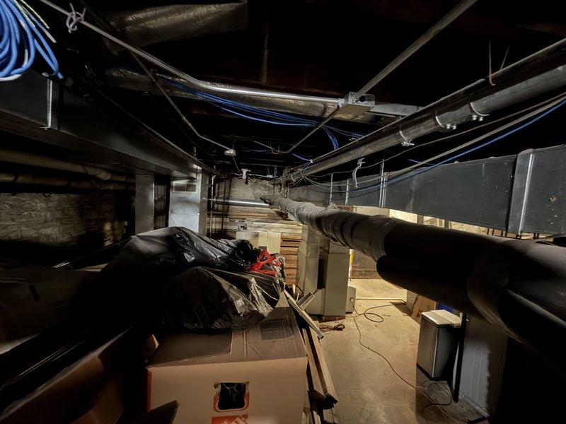 Provided comprehensive estimate for consolidating dual HVAC system into single-unit configuration, requiring removal of two existing furnaces and air conditioning units to be replaced with one complete system. Assessment included extensive ductwork remodeling requirements in basement area to accommodate new system layout and optimize airflow distribution throughout structure.