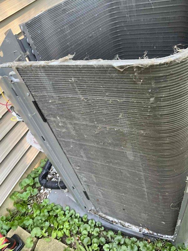Completed comprehensive BFMA tune-up service on outdoor condensing unit, including thorough coil cleaning to remove heavy accumulation of dirt, dust, and debris that was significantly restricting airflow through the finned sections. Performed standard AC maintenance procedures, replaced air filter as part of semi-annual filter change service, inspected electrical connections and disconnect box, and verified proper system operation upon completion.