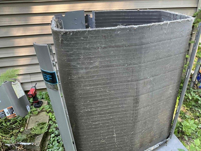 Completed comprehensive BFMA tune-up service on outdoor condensing unit, including thorough coil cleaning to remove heavy accumulation of dirt, dust, and debris that was significantly restricting airflow through the finned sections. Performed standard AC maintenance procedures, replaced air filter as part of semi-annual filter change service, inspected electrical connections and disconnect box, and verified proper system operation upon completion.