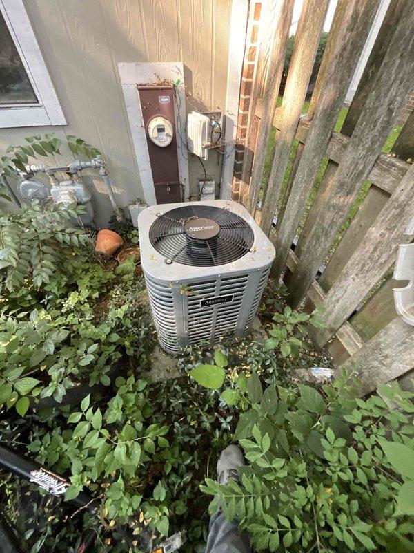Completed comprehensive BFMA tune-up service on a 6-year-old residential air conditioning system. Upon arrival, found the outdoor condensing unit heavily soiled with mud, dirt, and organic debris, with overgrown vegetation encroaching on the equipment. Performed thorough cleaning of condenser coils and exterior surfaces, cleared surrounding vegetation to restore proper airflow clearance, and completed all standard preventive maintenance procedures including electrical connections inspection, refrigerant level verification, and operational testing to ensure optimal system performance.