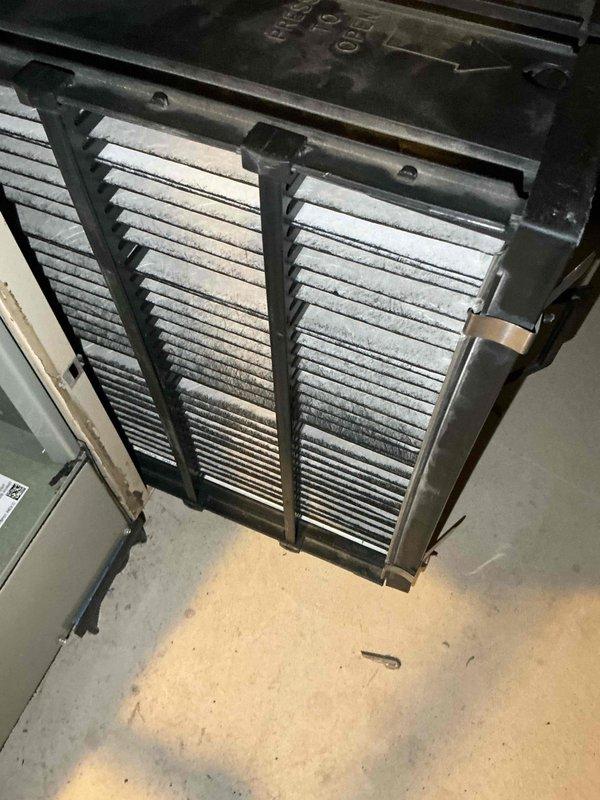 Completed comprehensive BFMA tune-up service on a 6-year-old residential HVAC system. Performed full AC maintenance including inspection of outdoor condenser unit positioned on concrete pad with proper clearances, checked refrigerant levels, cleaned coils, and verified electrical connections. Inspected indoor air handler and documented heavily soiled pleated filters requiring replacement due to significant dust and debris accumulation restricting airflow. All system components operating within manufacturer specifications upon completion of preventive maintenance protocol.