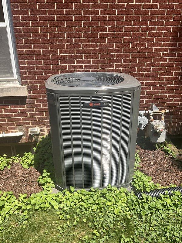 Completed comprehensive BFMA preventive maintenance tune-up on 4-year-old Trane outdoor condensing unit. Performed full system inspection including refrigerant charge verification, electrical component testing, condenser coil cleaning, and air filter evaluation. All components operating within manufacturer specifications with no deficiencies noted; unit ready for cooling season operation.