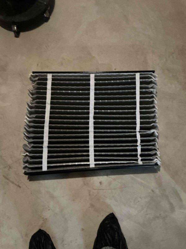 Completed comprehensive BFMA tune-up service on residential air conditioning system with equipment age of 5+ years. Upon arrival, found outdoor condenser coil heavily contaminated with dust, dirt, pollen, pet hair, and organic debris significantly restricting airflow through fins. Performed thorough coil cleaning to restore proper heat transfer efficiency. Removed and serviced evaporator coil, cleaning all fin surfaces to eliminate buildup and ensure optimal system performance. Inspected all major components, verified refrigerant levels, checked electrical connections, and tested system operation to manufacturer specifications. Unit now operating at peak efficiency with improved airflow and heat exchange capabilities.