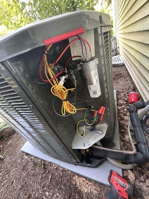 Completed annual air conditioning tune-up and preventive maintenance on residential outdoor condensing unit. Performed comprehensive system inspection including electrical component examination, capacitor testing, and contactor evaluation. Accessed electrical compartment to verify all connections were secure and within manufacturer specifications. Inspected refrigerant lines and insulation for proper condition. Verified unit operation and confirmed system cycling properly. All components found to be functioning within normal parameters with no immediate service needs identified.