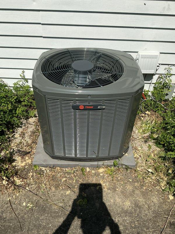 Completed comprehensive air conditioning tune-up on 3-year-old Trane condenser unit. Performed full system inspection including refrigerant level check, electrical component testing, condenser coil cleaning, and airflow verification. Replaced dirty air filter and confirmed all mechanical and electrical components operating within manufacturer specifications.