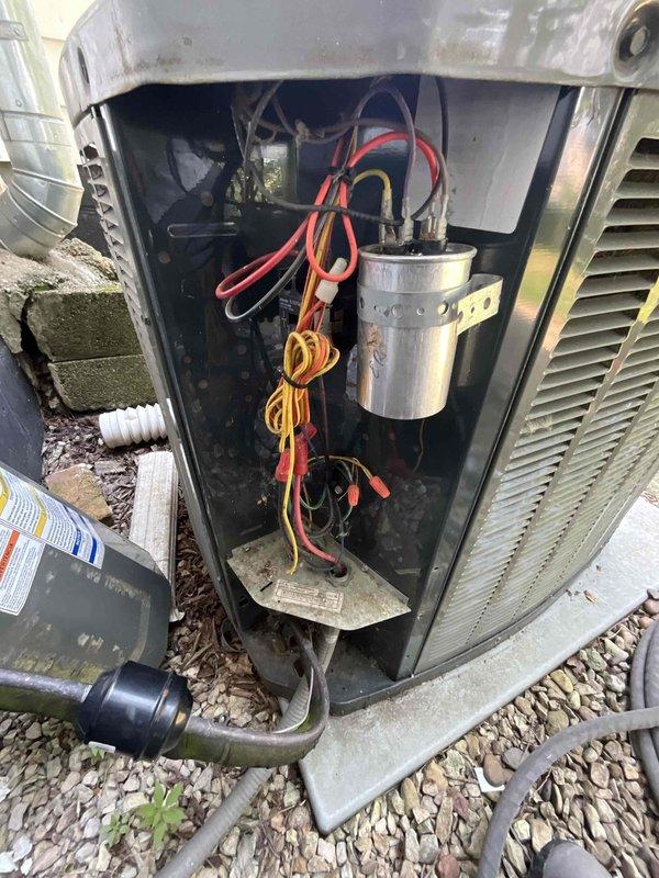 Completed comprehensive BFMA preventative maintenance tune-up on outdoor air conditioning condenser unit. Performed full system inspection including electrical components, capacitor testing, refrigerant line examination, and cleaning of condenser coils which showed moderate dirt and debris accumulation on the fins. All electrical connections were verified secure, capacitor tested within specifications, and unit operational parameters confirmed normal upon completion of service.