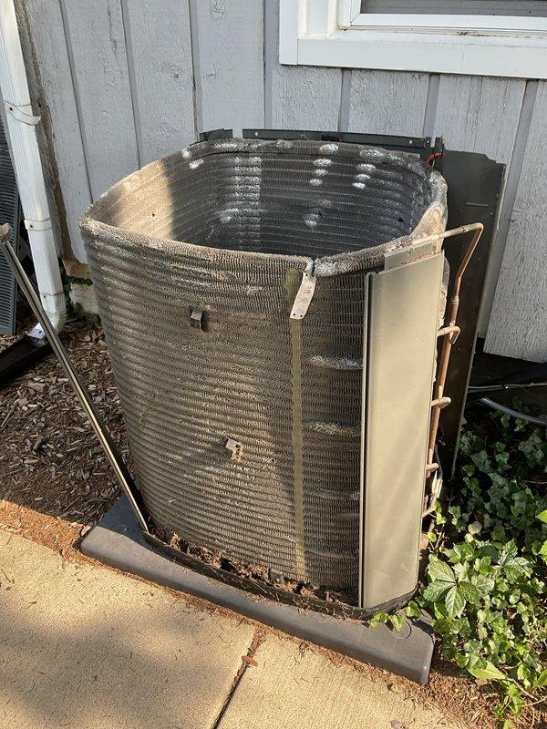 Completed comprehensive BFMA tune-up service on residential HVAC system with equipment age 5+ years. Performed full air conditioning system inspection and maintenance including condenser unit evaluation, filter inspection, and standard preventative maintenance procedures. Outdoor condenser unit showed normal weathering and operational wear consistent with age; verified proper operation and documented equipment condition with photographic records for maintenance history.