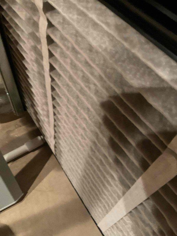 Completed comprehensive BFMA tune-up service on a one-year-old air conditioning system. Performed thorough inspection of air handler unit and evaporator coil assembly located in attic space, noting accumulation of dust and debris on coil fins despite relatively new equipment age. Inspected and documented condition of pleated air filter and internal components, checking for proper airflow and system operation to ensure optimal performance and efficiency.