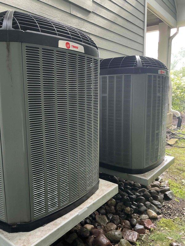 Completed comprehensive BFMA tune-up service on two outdoor air conditioning condenser units, including one Trane system. Performed standard maintenance procedures on both units consisting of inspection of electrical connections, refrigerant level verification, condenser coil cleaning, and operational testing to ensure proper cooling performance. Both systems are approximately 2+ years old and were found to be operating within normal parameters upon completion of preventative maintenance service.