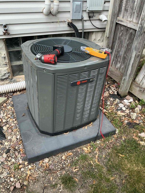 Completed comprehensive BFMA tune-up service on two Trane air conditioning systems, both over 5 years old. Performed full system diagnostics including electrical testing with multimeter and clamp meter, inspected refrigerant lines and connections, cleaned condenser coils, checked compressor operation, and replaced air filters. All units tested within normal operating parameters and left in proper working condition.