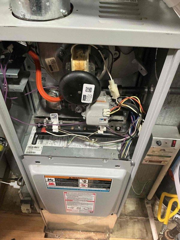 Completed comprehensive BFMA tune-up service on residential HVAC system with one-year-old equipment. Performed full system inspection including furnace interior components, gas valve assembly, electrical connections, and blower wheel assembly. Verified all mechanical and electrical components operating within manufacturer specifications, confirmed proper wiring connections, inspected blower motor and squirrel cage fan for debris and wear, and documented system condition with photographic records.