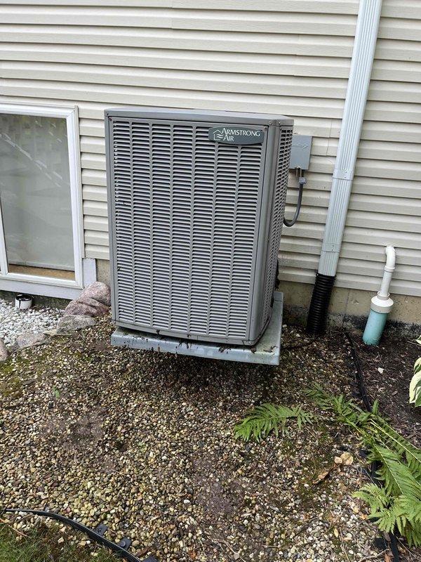 Completed comprehensive air conditioning tune-up on 3-year-old Armstrong Air condensing unit. Performed full system inspection, tested electrical components and refrigerant levels, cleaned condenser coils, and documented severely clogged air filter requiring immediate replacement due to heavy dust and debris accumulation restricting airflow. System now operating within manufacturer specifications with improved efficiency following filter replacement and routine maintenance procedures.