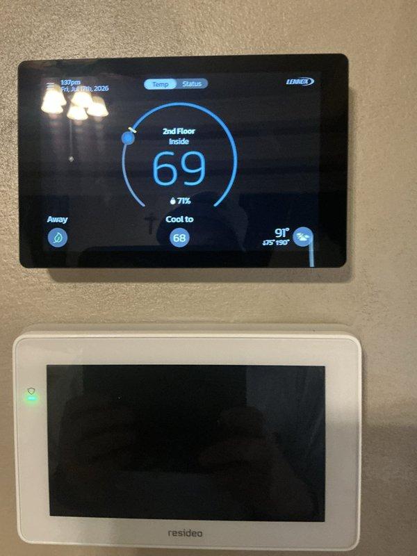 Completed full HVAC system installation including SLP99 modulating furnace and SL25 modulating air conditioning unit in attic space. Installed S40 smart thermostat with 7/8 shielded wire run to second and third floor zones, powered humidifier, and APCO UV light for air quality. Equipment outfitted with attic package components including high-rise condensate pan, eight anti-vibration pads, overflow wet switch, and condensate safety overflow switch for proper drainage protection and vibration dampening. Verified operation of existing system and confirmed all new equipment functioning correctly with proper temperature control and zone management across multiple floors.