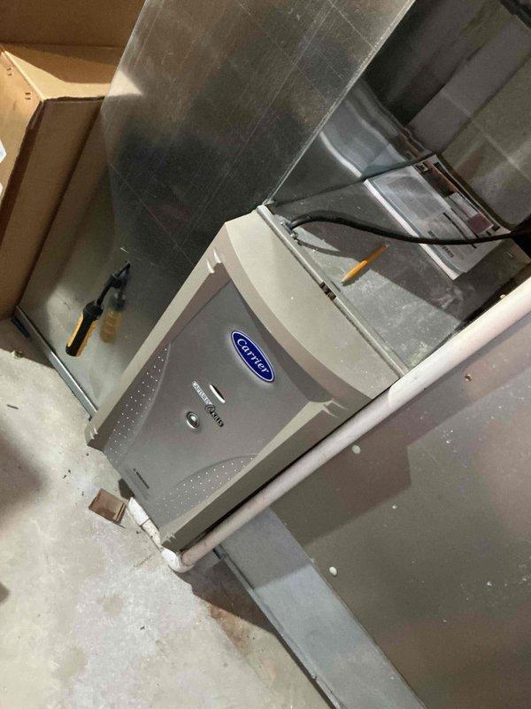 Completed comprehensive BFMA preventative maintenance tune-up on 16-year-old Carrier air conditioning system. Performed full system inspection including electrical connections, contactor assembly, and terminal block wiring verification; all connections tested secure with proper voltage readings. Inspected air handler unit and ductwork system in attic space; confirmed proper airflow and assessed overall system operation for seasonal readiness.