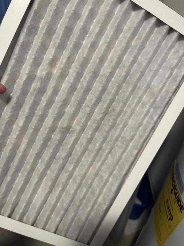 Completed comprehensive BFMA tune-up on 14-year-old air conditioning system. Performed full system inspection including condenser coil evaluation, which showed clean heat exchanger fins with proper spacing and no visible damage or deterioration. Inspected and documented air filter condition, noting accumulated dust and debris with moderate particulate buildup throughout pleated media requiring replacement for optimal airflow and system efficiency.