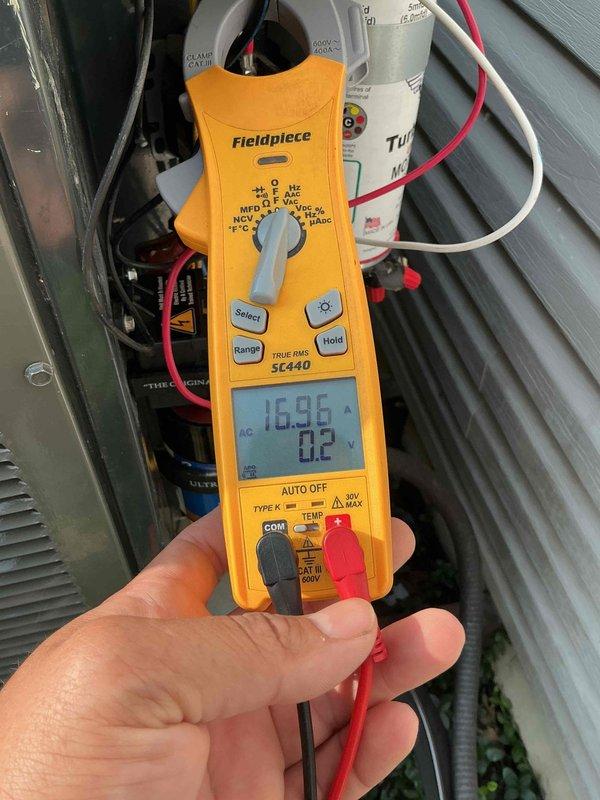 Responded to no cooling complaint following recent repairs with loud noise reported by client. Performed diagnostic testing of electrical components and measured system amperage at 16.96A. Inspected capacitor, relay, and wiring connections inside unit, documenting conditions with before and after photos as requested by client.