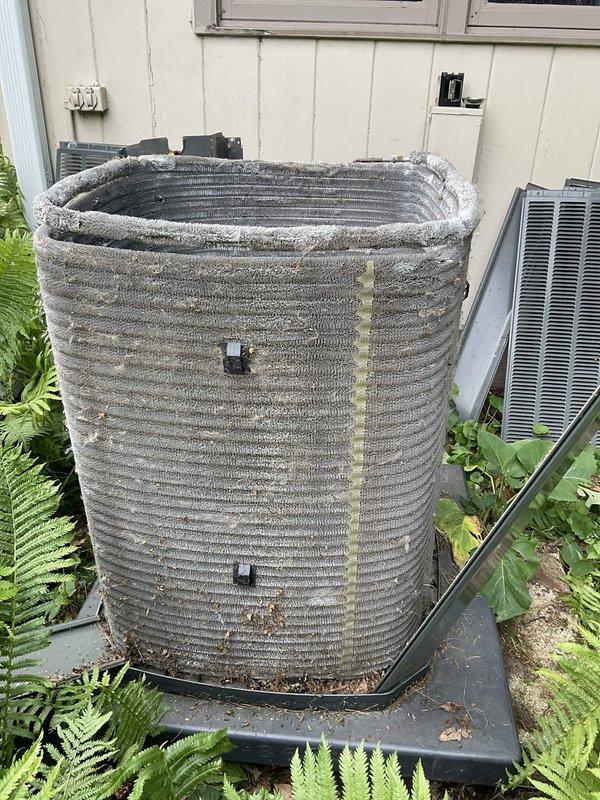 Completed comprehensive AC tune-up on outdoor condensing unit with 4+ years of service. Upon arrival, found condenser coil heavily obstructed with dense accumulation of lint, dust, and debris significantly restricting airflow. Performed thorough coil cleaning to restore proper heat transfer efficiency, inspected all electrical connections and components, verified refrigerant pressures, and tested system operation to ensure optimal performance.