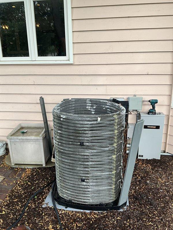 Completed comprehensive BFMA tune-up service on 14-year-old residential air conditioning system. Performed standard maintenance protocol including inspection of outdoor condensing unit with cylindrical coil assembly, verified electrical disconnect functionality, checked condensate pump operation, and inspected indoor evaporator coil and filter assembly. All components operating within normal parameters; system tested and confirmed ready for continued service.