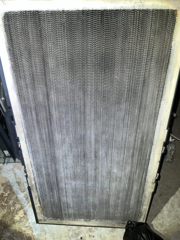 Completed comprehensive BFMA tune-up service on 14-year-old residential air conditioning system. Performed standard maintenance protocol including inspection of outdoor condensing unit with cylindrical coil assembly, verified electrical disconnect functionality, checked condensate pump operation, and inspected indoor evaporator coil and filter assembly. All components operating within normal parameters; system tested and confirmed ready for continued service.