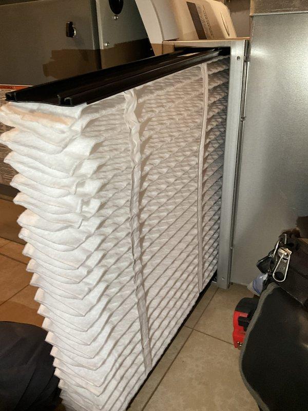 Completed comprehensive BFMA tune-up on 6-year-old residential air conditioning system. Replaced heavily soiled air filter that was significantly clogged with dust and debris, which was restricting airflow and reducing system efficiency. Performed standard AC maintenance procedures including inspection of air handler unit, verification of proper filter installation, and system operational check to ensure optimal performance.