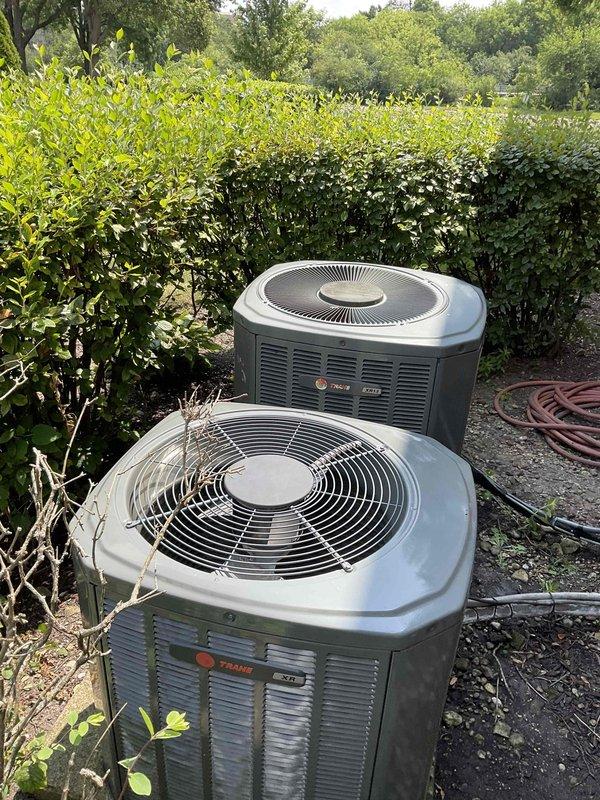 Completed comprehensive BFMA tune-up service on dual 18-year-old Trane air conditioning systems. Performed preventive maintenance including inspection of both outdoor condenser units, verification of blower wheel assembly operation, cleaning of components, and system performance evaluation to ensure optimal cooling efficiency for the upcoming season.