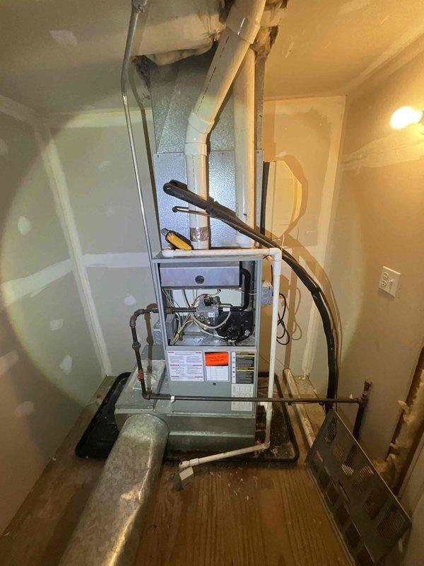 Conducted comprehensive full system HVAC estimate for residential property. Evaluated attic-mounted air handler unit and associated equipment including condensate drainage system, copper refrigerant lines, and ductwork with insulation. Inspected electrical service panel to assess circuit capacity and compatibility for proposed HVAC system replacement, noting existing air conditioning circuit and available breaker positions. Documented current equipment specifications, installation configuration, and mechanical access via pull-down attic ladder. Assessed system placement constraints within confined attic space and evaluated existing electrical infrastructure to determine requirements for new equipment installation.