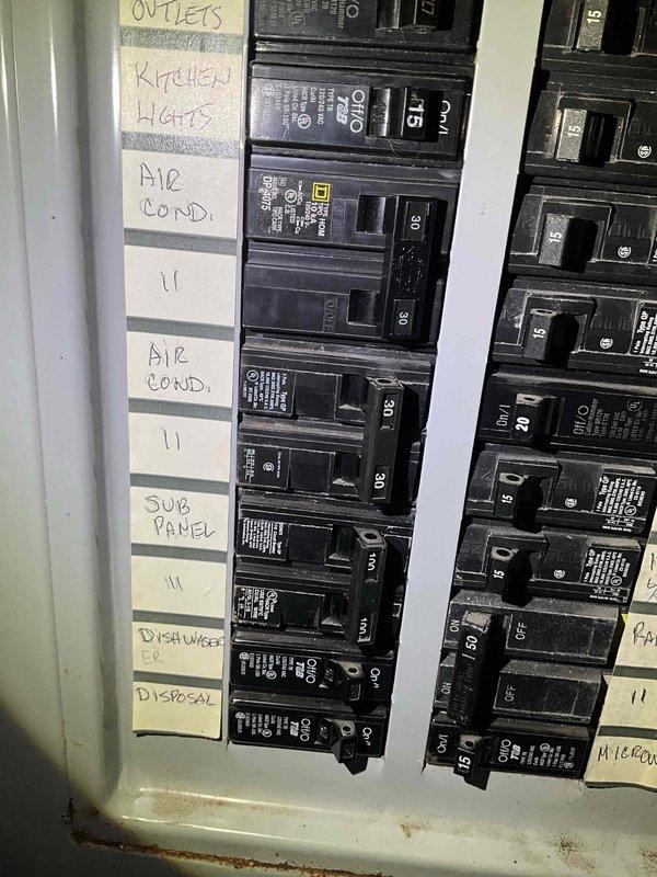 Conducted comprehensive full system HVAC estimate for residential property. Evaluated attic-mounted air handler unit and associated equipment including condensate drainage system, copper refrigerant lines, and ductwork with insulation. Inspected electrical service panel to assess circuit capacity and compatibility for proposed HVAC system replacement, noting existing air conditioning circuit and available breaker positions. Documented current equipment specifications, installation configuration, and mechanical access via pull-down attic ladder. Assessed system placement constraints within confined attic space and evaluated existing electrical infrastructure to determine requirements for new equipment installation.