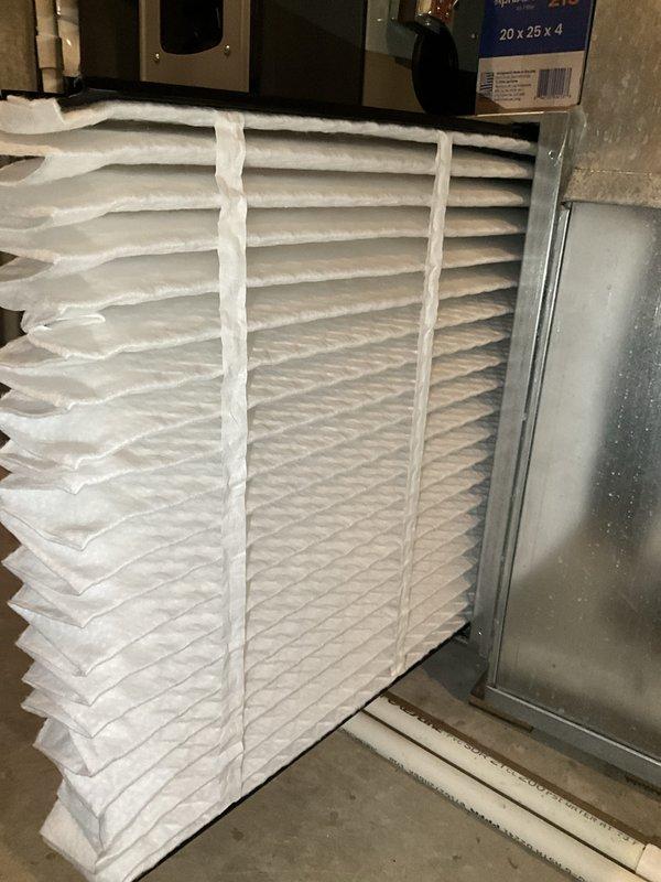 Completed comprehensive BFMA tune-up on 13-year-old residential air conditioning system, addressing previous no-cool concerns from earlier scheduled visit. Performed full system inspection, verified thermostat operation displaying 69°F setpoint, and replaced air filter with new 20x25x4 pleated media filter as part of semi-annual filter change service. All AC components tested and operating within normal parameters upon completion.