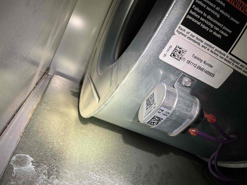 Responded to service call for furnace leaking water into sump pump area. Upon inspection, discovered heavy frost and ice accumulation on evaporator coil and refrigerant lines, indicating a restricted airflow condition or potential refrigerant issue. The excessive ice buildup was causing water overflow as the system cycled and frost melted. Advised customer that unit had been properly shut down to prevent further water damage. Documented equipment condition with photographs showing frosted copper tubing, oxidized components, and accumulated debris within cabinet. Recommended thorough system evaluation including airflow assessment, filter inspection, and possible drain line verification once ice has fully melted to determine root cause and prevent recurrence.