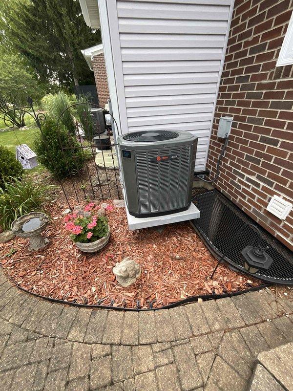 Completed comprehensive BFMA tune-up service on 3-year-old Trane air conditioning system. Upon inspection, discovered significant accumulation of debris, dust, and lint heavily impacting the condenser coil, with buildup several inches thick throughout the aluminum fins, severely restricting airflow and reducing system efficiency. Thoroughly cleaned condenser coil to restore proper heat transfer capability, inspected refrigerant lines and connections, verified electrical components, and tested system operation to ensure optimal performance.
