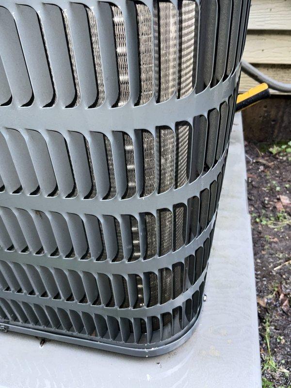 Completed comprehensive BFMA tune-up on 12+ year old residential air conditioning system following previous no-cool service calls. Performed full system inspection, verified proper operation of condenser unit including fan motor and compressor, checked refrigerant levels and electrical connections at outdoor disconnect, cleaned condenser coils, and confirmed unit is cooling effectively. All components operating within normal parameters with no deficiencies noted at time of service.