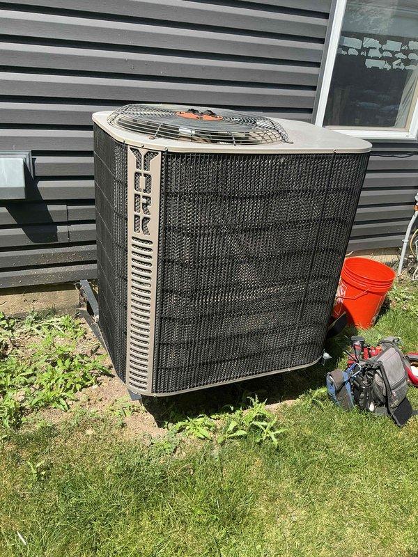 Completed non-member air conditioning tune-up maintenance service on residential split system. Removed bird's nest from interior vent above air handler unit, inspected refrigerant lines for leaks and proper insulation noting condensation present on copper tubing, and performed standard preventative maintenance on outdoor condenser unit including cleaning coils and checking fan operation. All components tested and system operating within normal parameters upon completion.