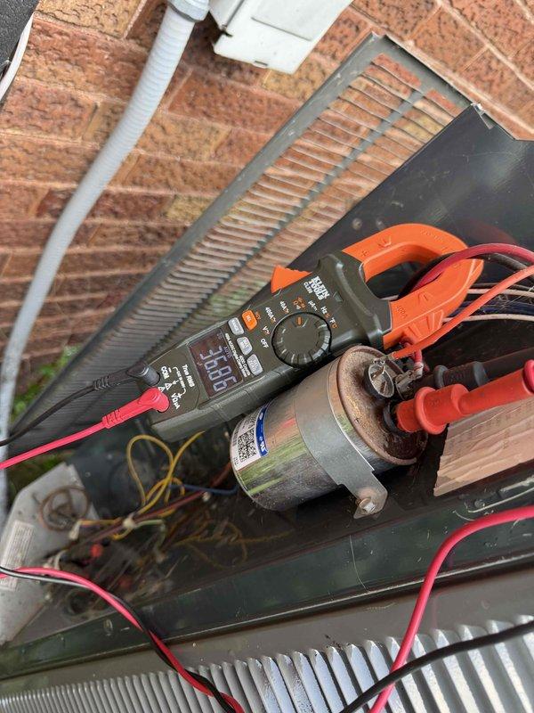 Completed comprehensive BFMA tune-up service on a 22+ year old air conditioning system during afternoon appointment window. Performed thorough system diagnostics including electrical testing of capacitor using digital multimeter with clamp meter to verify proper voltage and capacitance readings, ensuring optimal compressor and fan motor operation. Inspected outdoor condensing unit components, evaluated heat exchanger coil condition, and verified all electrical connections were secure and functioning within manufacturer specifications.