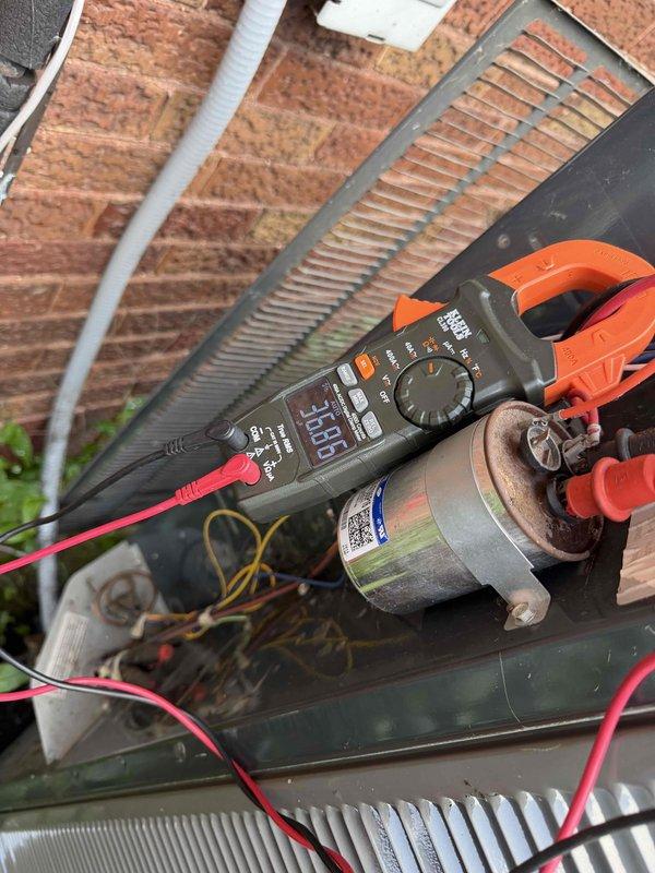 Completed comprehensive BFMA tune-up service on a 22+ year old air conditioning system during afternoon appointment window. Performed thorough system diagnostics including electrical testing of capacitor using digital multimeter with clamp meter to verify proper voltage and capacitance readings, ensuring optimal compressor and fan motor operation. Inspected outdoor condensing unit components, evaluated heat exchanger coil condition, and verified all electrical connections were secure and functioning within manufacturer specifications.