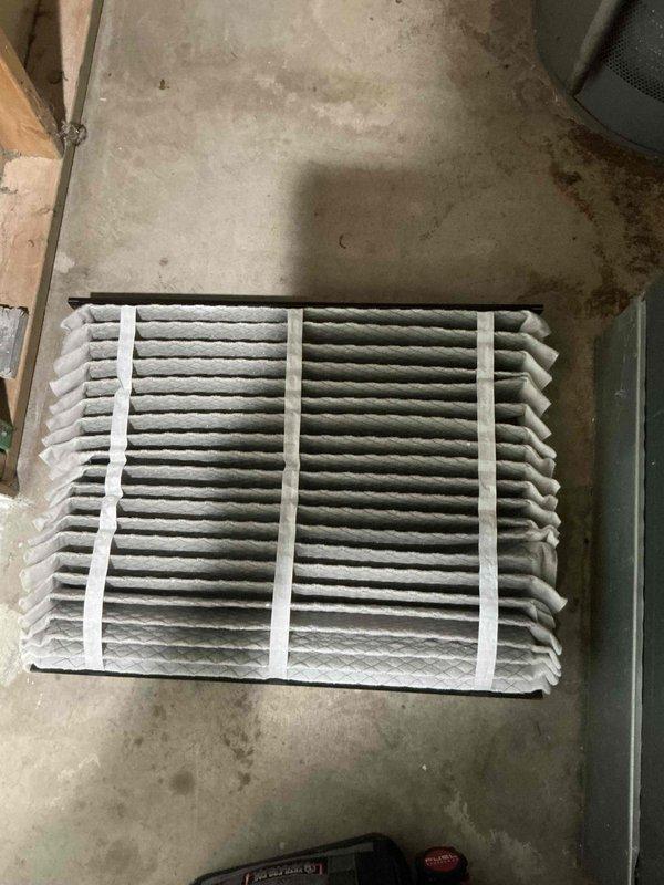 Completed comprehensive BFMA air conditioning tune-up on 4-year-old system per recurring maintenance agreement. Replaced heavily soiled air filter showing significant dust and debris accumulation throughout pleated media. Cleaned exterior condenser grille which exhibited cobwebs, dirt buildup, and weathering from outdoor exposure. Performed standard preventive maintenance inspection including system operational checks, refrigerant level verification, electrical connection testing, and component performance evaluation to ensure optimal efficiency and reliability for continued operation.