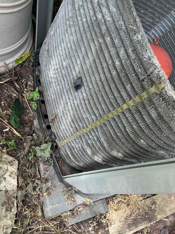 Completed comprehensive BFMA tune-up on 13-year-old air conditioning system, including full inspection of outdoor condenser unit and air handler components. Cleaned condenser coil which showed significant accumulation of dirt, debris, and organic matter between fins, and replaced 16x25x1 air filter. System tested and confirmed operational within manufacturer specifications.