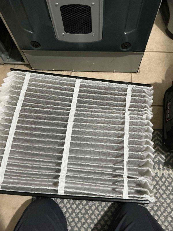 Completed comprehensive BFMA tune-up service on 11-year-old HVAC system, including full AC inspection and maintenance. Replaced heavily soiled air filter with new pleated filter, removing accumulated dust, debris, and lint that had restricted airflow through the return air grill. Performed standard semi-annual filter change service and AC system evaluation to ensure optimal performance and efficiency.