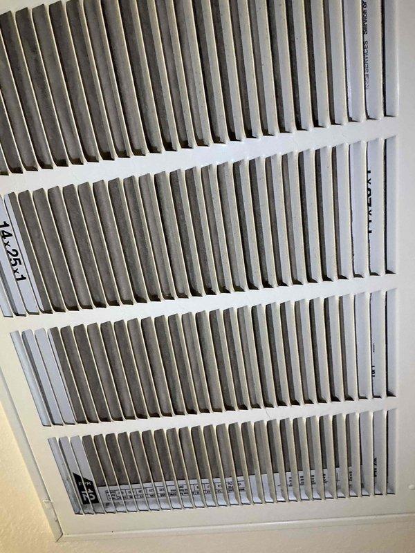 Completed comprehensive BFMA tune-up on 8-year-old air conditioning system during scheduled afternoon appointment. Performed standard preventive maintenance protocol including inspection of indoor return air vent and outdoor condenser unit, which showed moderate accumulation of dirt and debris on coil fins requiring attention. Documented equipment condition with photographs for maintenance records and verified system operational status per manufacturer specifications.