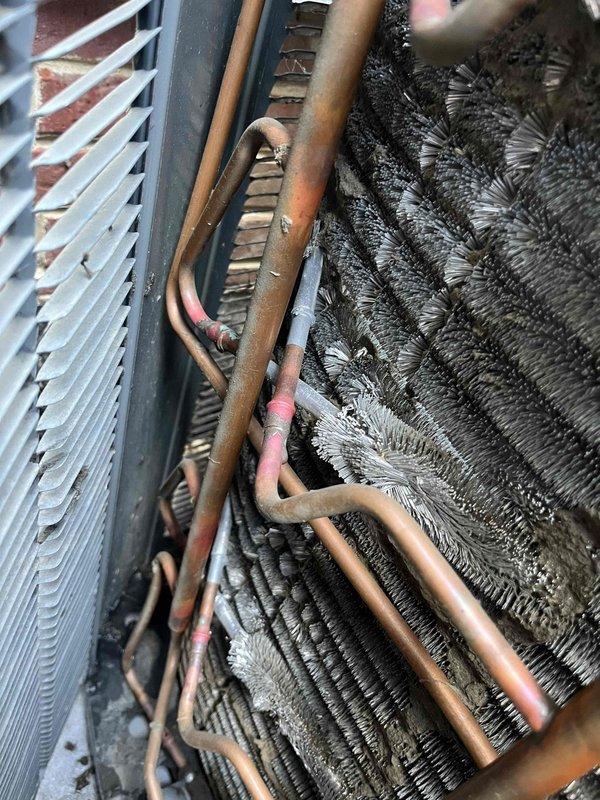 Completed comprehensive BFMA tune-up service on two air conditioning systems, both approximately 2+ years old. Performed thorough inspection and maintenance of both units, which revealed significant dust accumulation on evaporator coils and filter media requiring attention. Cleaned coils, checked refrigerant lines for proper connections and condition, verified system operations, and replaced air filters per maintenance agreement specifications to restore optimal airflow and system efficiency.
