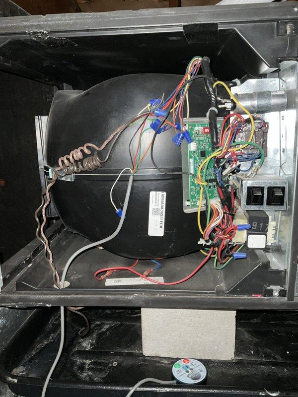Completed comprehensive BFMA tune-up on residential air conditioning system with 5-year-old equipment. Performed standard maintenance procedures including inspection of blower motor assembly, control board functionality verification, and electrical connections check. Verified Honeywell programmable thermostat operation showing proper temperature control at 76 degrees with system functioning in auto mode, and assessed attic unit layout and accessibility for ongoing maintenance requirements.