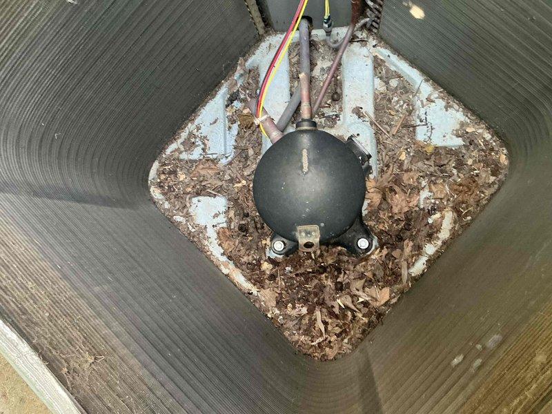 Completed comprehensive BFMA tune-up on dual outdoor condenser units, approximately 13 years old. Performed standard air conditioning maintenance protocol including inspection of both units, cleaning of accumulated organic debris from pressure switch assembly and diamond-shaped access opening, and verification of all electrical connections and wiring. Both condenser units inspected for proper operation, with fan assemblies and heat exchanger fins evaluated for optimal airflow and heat transfer efficiency.