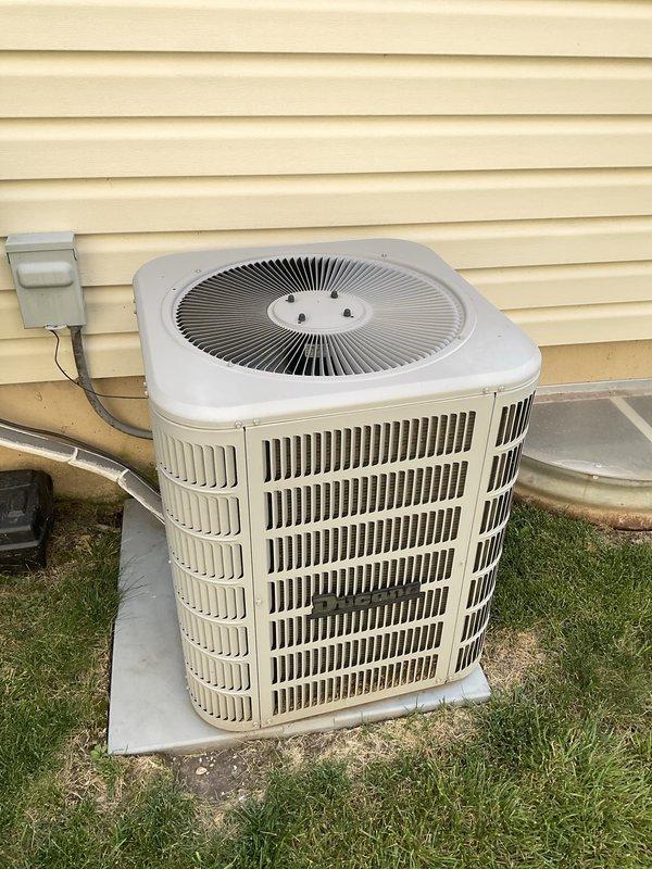 Completed comprehensive BFMA air conditioning tune-up on 8-year-old residential outdoor condensing unit. Performed standard maintenance protocol including inspection of all major components, cleaning of condenser coils and exterior surfaces which showed significant dust and debris accumulation, verified refrigerant levels, tested electrical connections and disconnect box, checked fan motor operation, and confirmed proper system operation. Unit returned to optimal performance with improved airflow efficiency following cleaning of heavily soiled mesh grille panels and condenser fins.