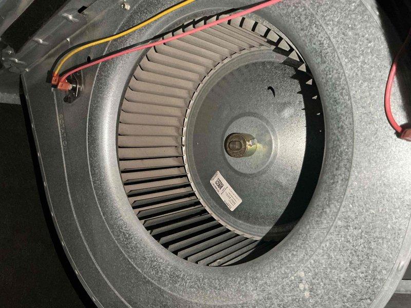 Completed comprehensive air conditioning tune-up on a 4-year-old residential system. Performed full system inspection including blower wheel assembly examination, electrical connections testing with amp draw readings of 49.55, and verification of all operational components. All equipment found operating within normal parameters with routine maintenance successfully completed.