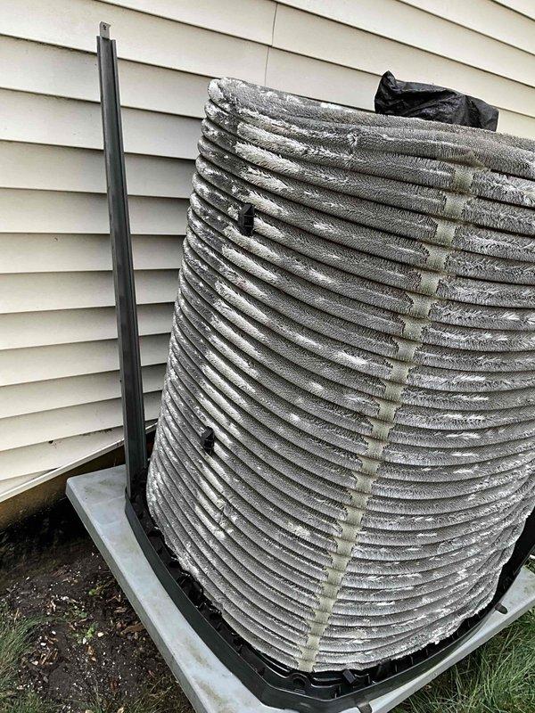 Completed comprehensive BFMA tune-up service on 4-year-old residential air conditioning system. Performed full system inspection including electrical components, capacitor testing, and coil examination. Unit accessed and serviced with all internal components checked, cleaned condenser coil, verified proper operation, and secured unit upon completion.