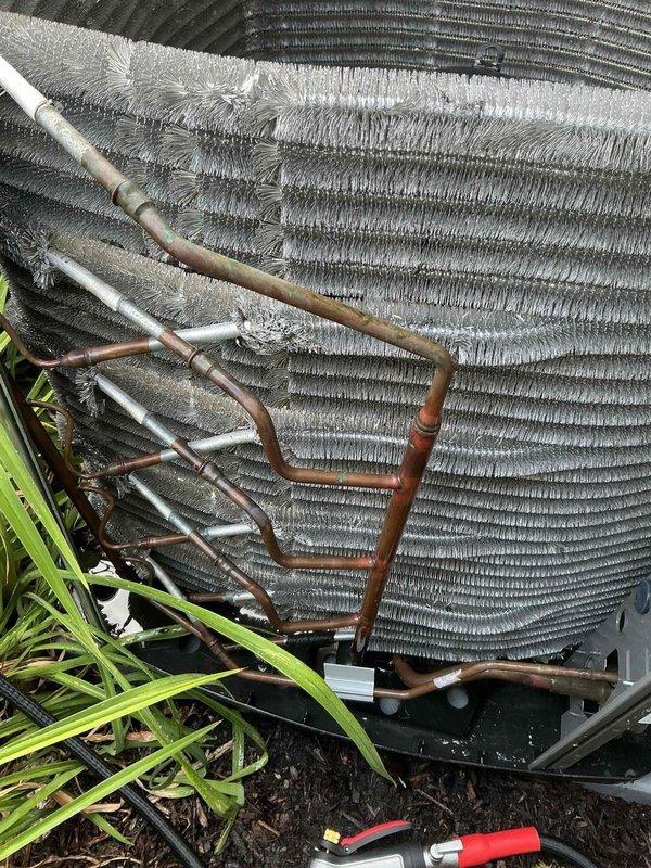 Completed comprehensive BFMA tune-up on one-year-old air conditioning system. Performed detailed inspection of condenser unit, noting moderate dust and debris accumulation on exterior coil fins and oxidation present on copper refrigerant lines. Accessed and inspected blower motor assembly, fan blades, and electrical connections within air handler unit, confirming all components operational and properly secured.
