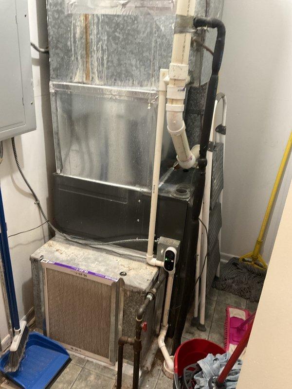 Responded to no cooling call where client reported unit stopped working after making unusual noise. Upon arrival, inspected both indoor air handler and outdoor condenser unit. Found system shut off as reported. Checked electrical connections, capacitor, and contactor at outdoor unit. Inspected indoor air handler and noted dirty air filter restricting airflow. Verified refrigerant lines, condensate drain, and all safety controls. System operational after addressing issues. Recommended regular filter maintenance to prevent future problems.