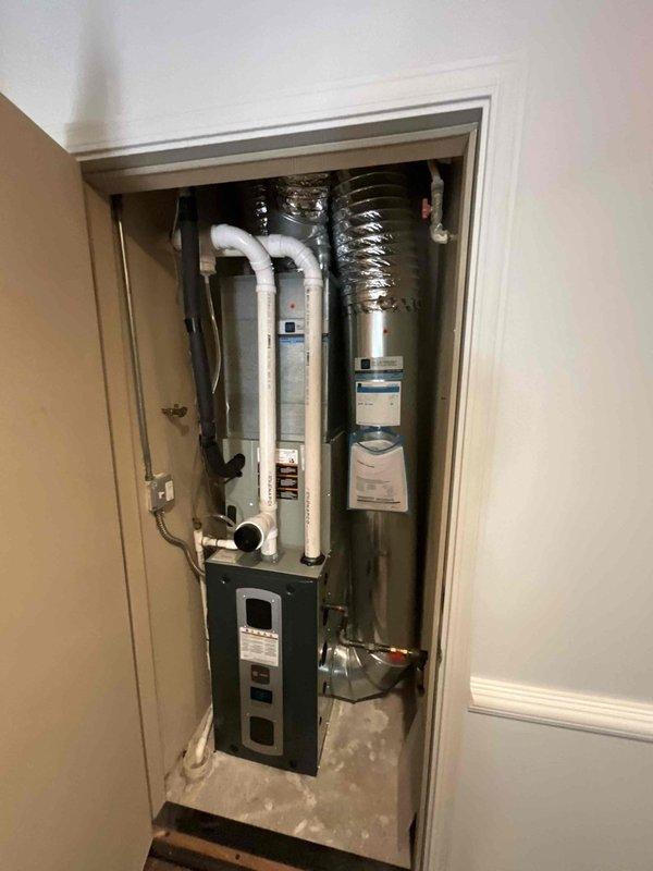 Completed comprehensive BFMA tune-up and preventive maintenance on residential HVAC system, including indoor furnace unit located in utility closet and rooftop air conditioning condenser units. Performed standard inspection procedures, cleaned components, checked refrigerant levels, tested electrical connections, verified proper airflow through ductwork, and ensured all equipment operating within manufacturer specifications. System confirmed to be approximately 5 years old and functioning properly with no immediate service needs identified.