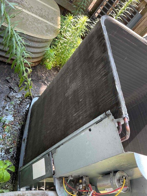 Completed comprehensive BFMA tune-up service on 18-year-old air conditioning system. Performed full system inspection of outdoor condensing unit, verified proper operation of compressor and refrigerant lines, and inspected condenser coil condition. Replaced air filter at indoor air handler, confirmed all mechanical components operating within normal parameters, and documented equipment condition with photographic records for maintenance history.