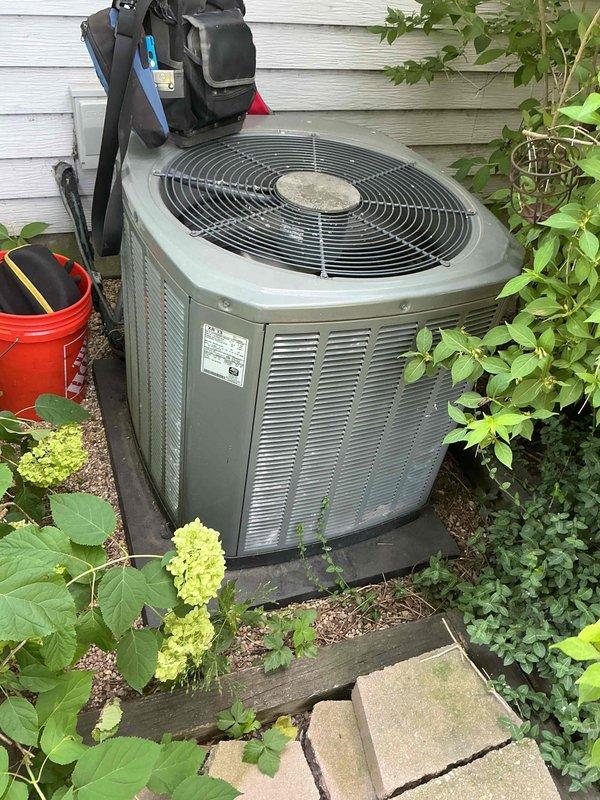Completed comprehensive BFMA tune-up on 16-year-old residential air conditioning system, including filter replacement and full AC service. Performed operational testing with digital multimeter, recording temperature differentials of 26.9°F and 25.3°F across the system. Inspected outdoor condenser unit, verified electrical connections and capacitor operation, cleaned coils, and confirmed proper refrigerant pressures and system performance for optimal cooling efficiency.