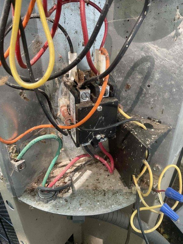 Completed comprehensive BFMA tune-up service on 18-year-old residential air conditioning system. Performed full system inspection including electrical connections, contactor operation, and exterior unit assessment. Interior components showed significant dirt and debris accumulation consistent with equipment age; cleaned and serviced all accessible areas, verified proper electrical connections and wire terminations, and confirmed unit operational status upon completion.